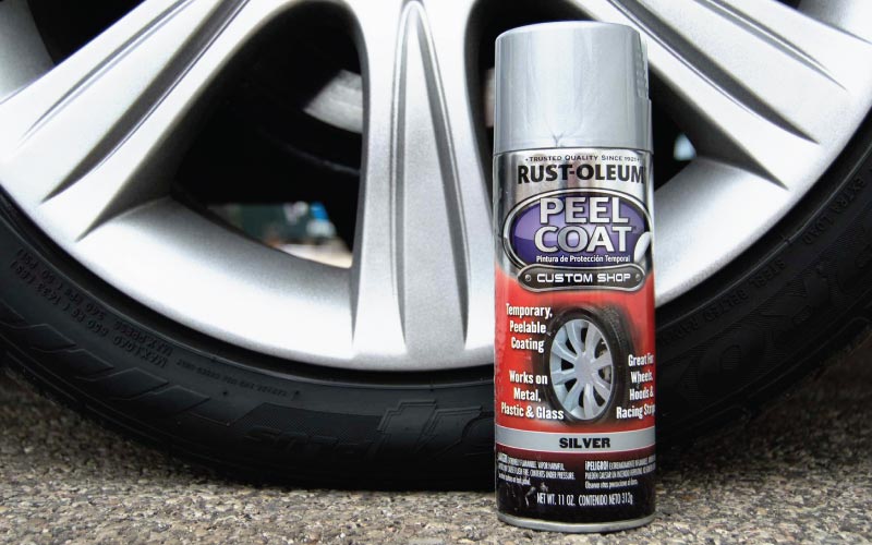 Rust-Oleum Peelcoat Label Design on Spray Paint Can In Front of Car Tire